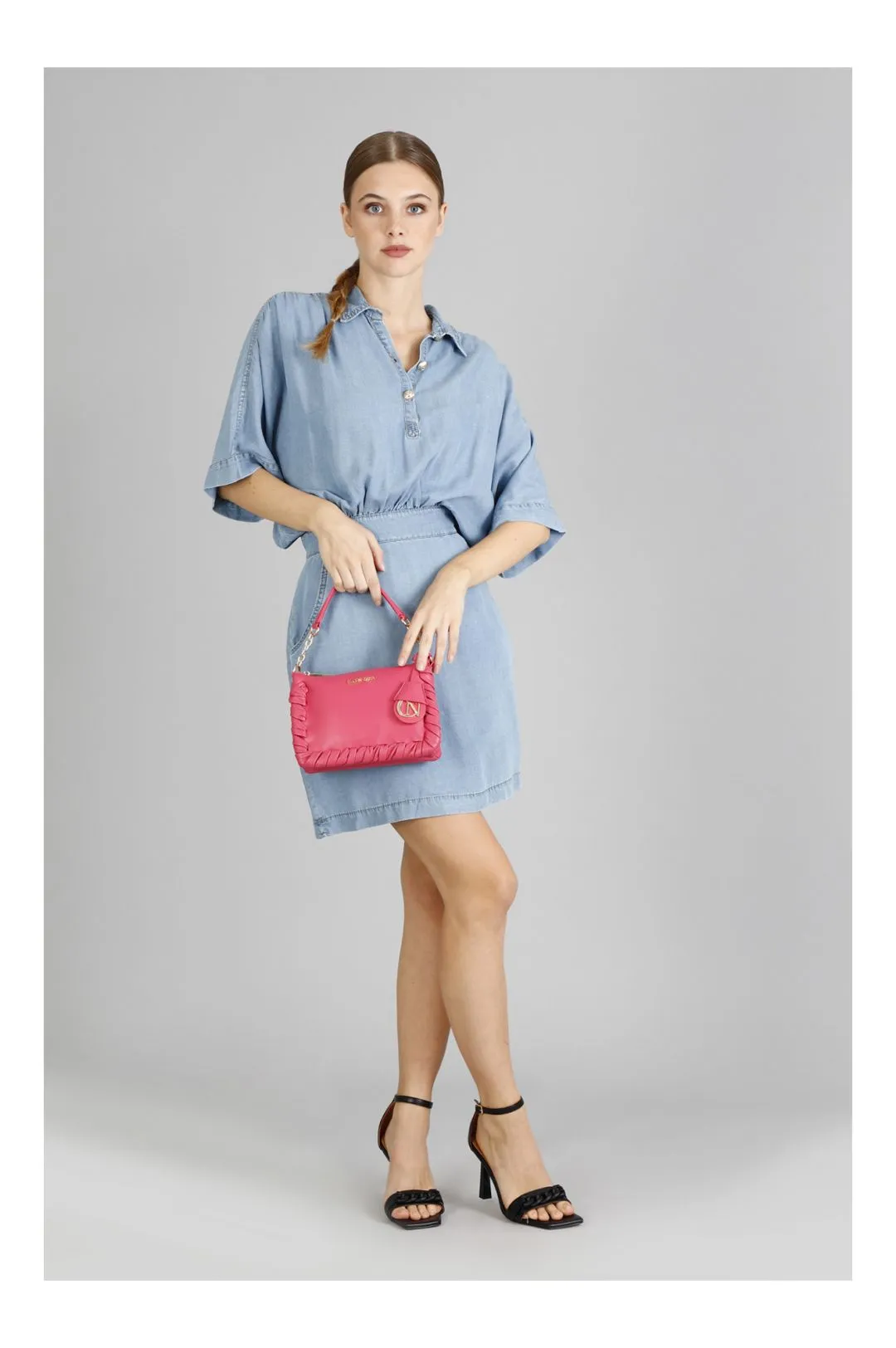 borsa morbida con zip e infilature ai bordi fuxia