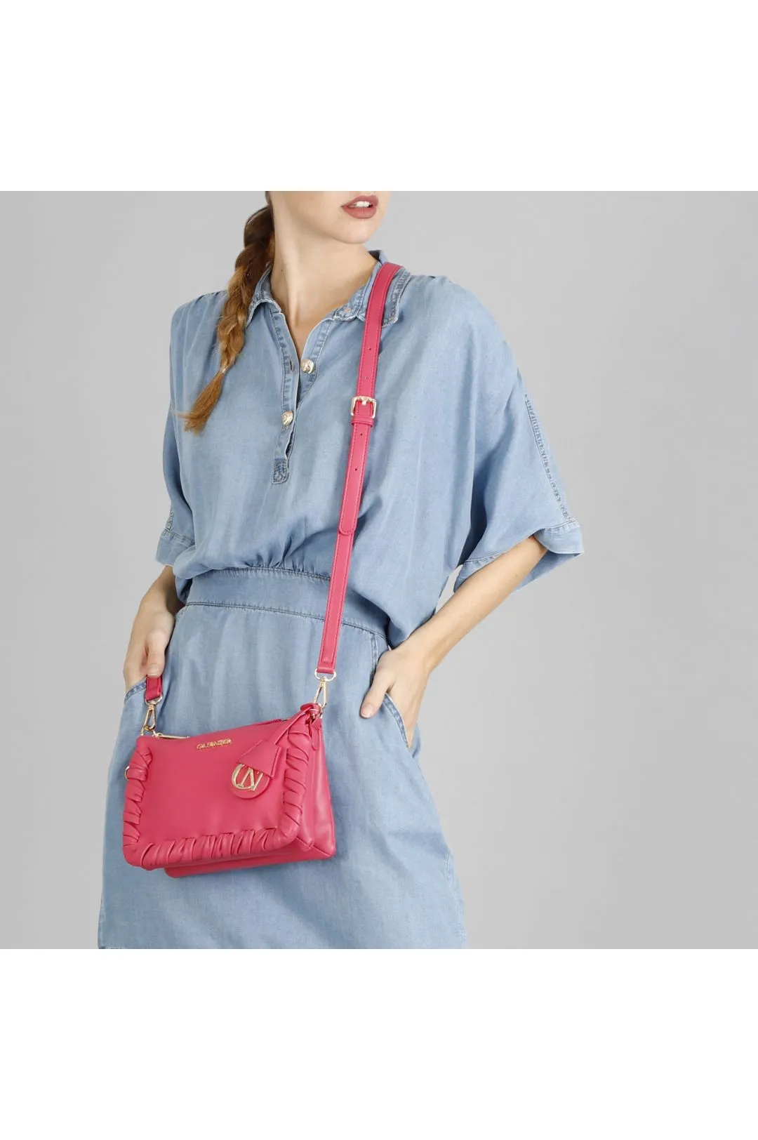 borsa morbida con zip e infilature ai bordi fuxia