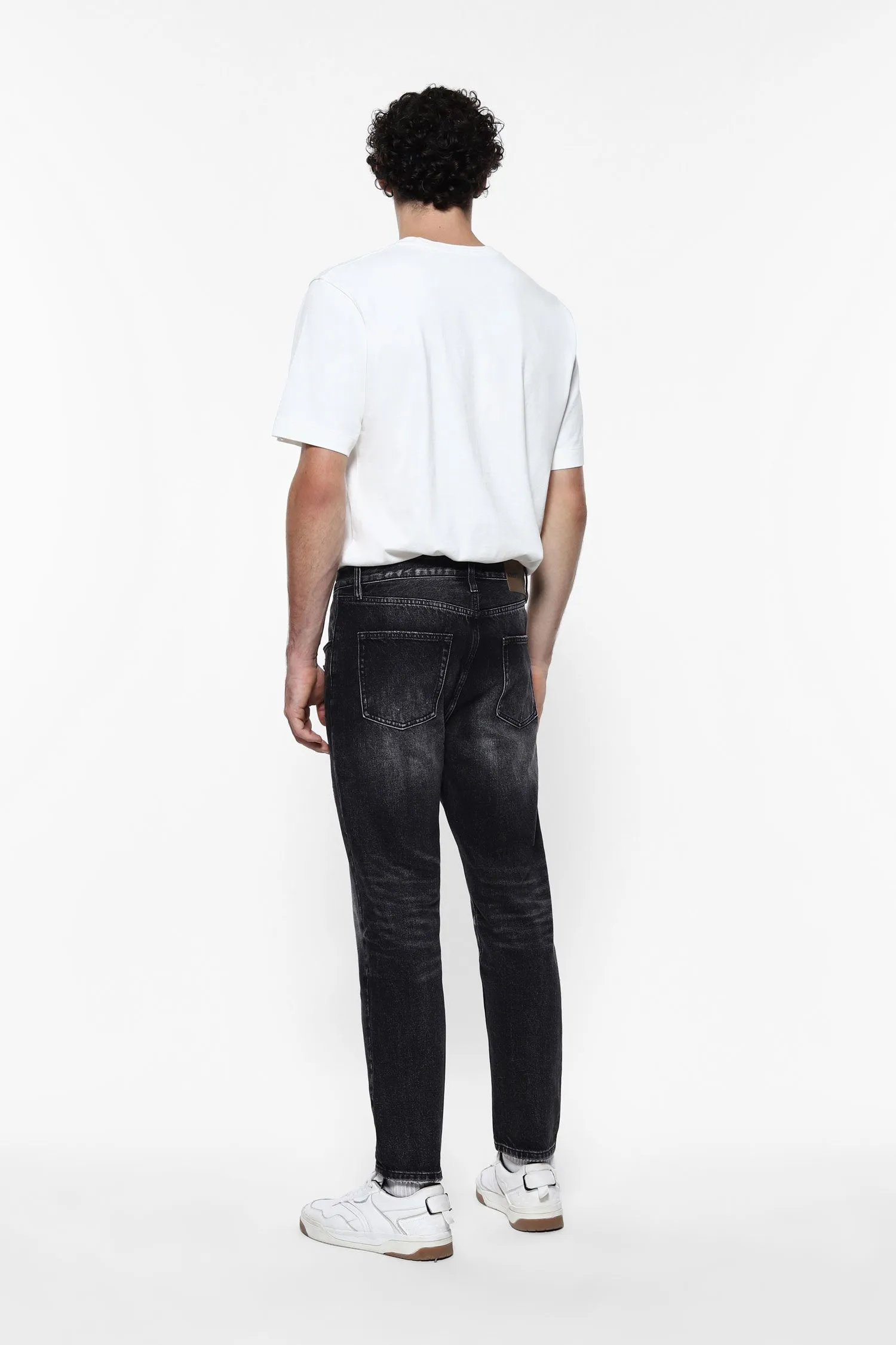   Jeans slim-fit delavé     