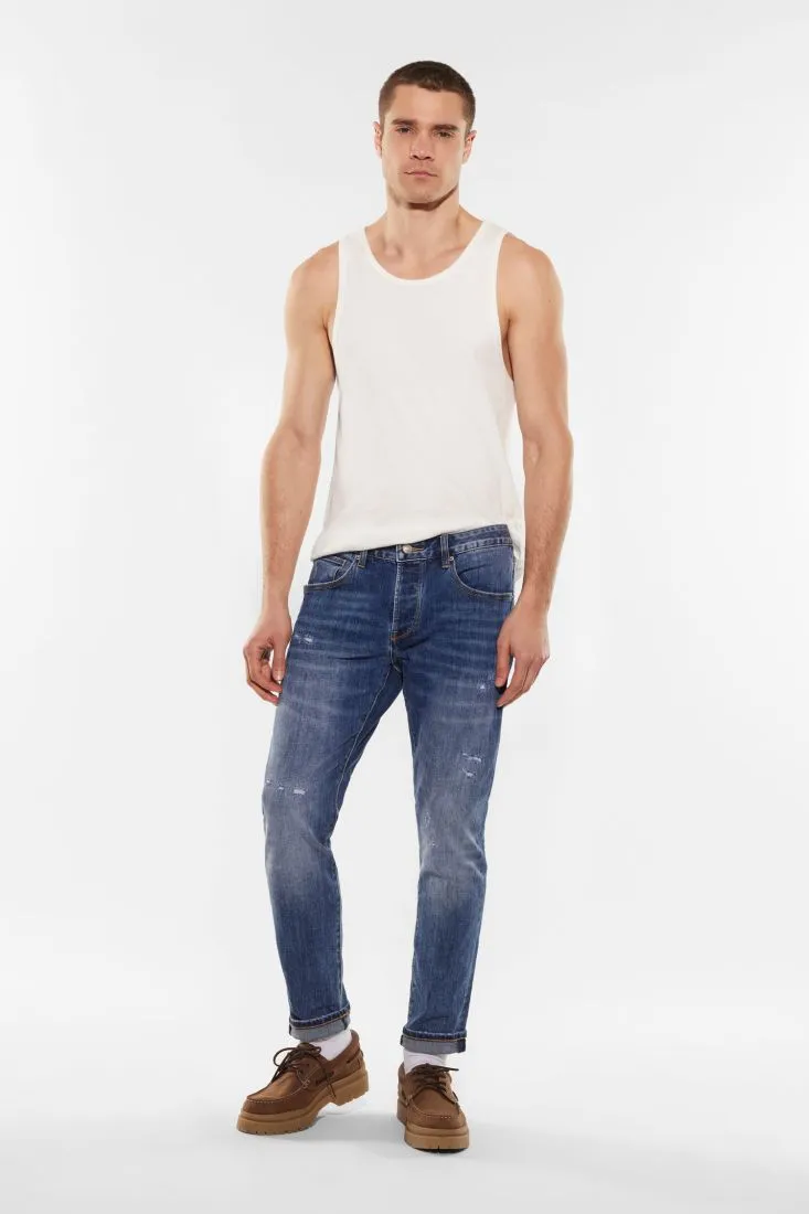 Jeans slim-fit effetto délavé con abrasioni