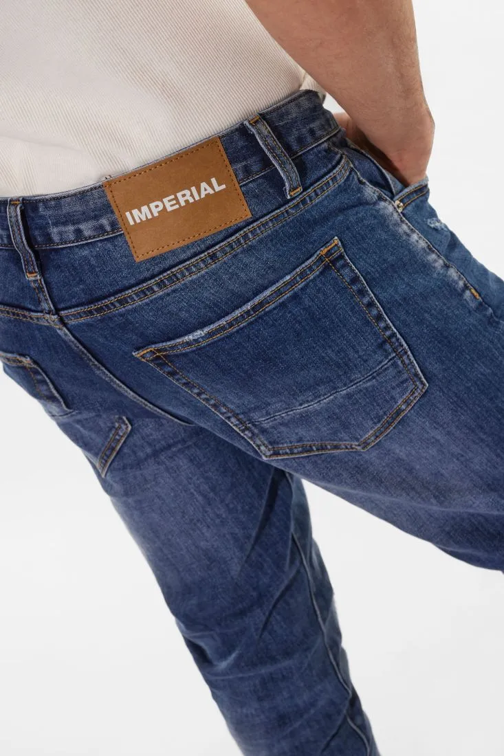 Jeans slim-fit effetto délavé con abrasioni