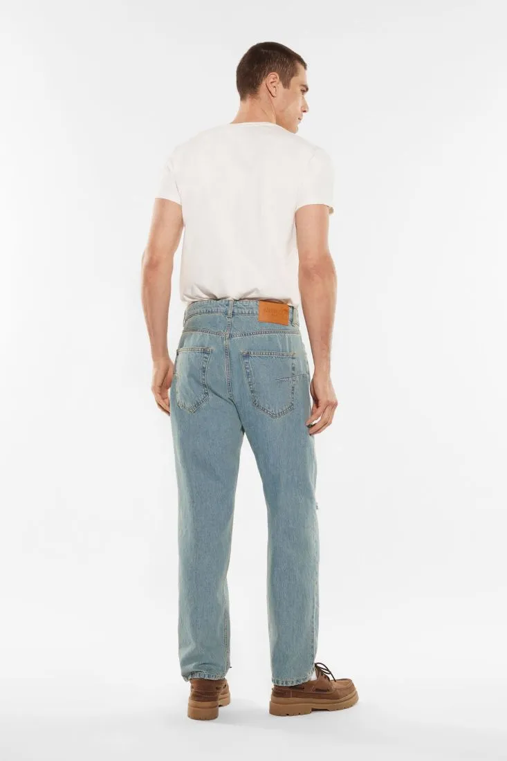 Jeans slim-fit in puro cotone con abrasioni