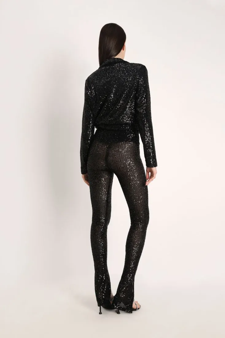 Pantalloni slim-fit in paillettes effetto trasparenza
