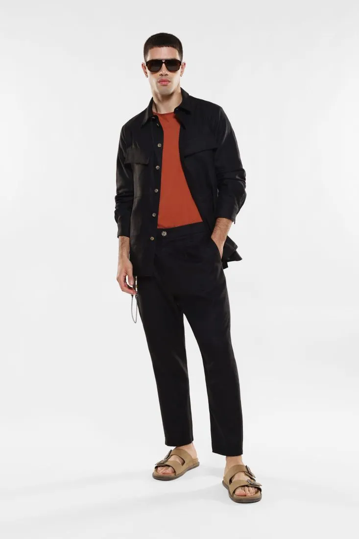 Pantaloni slim-fit con pinces e catena