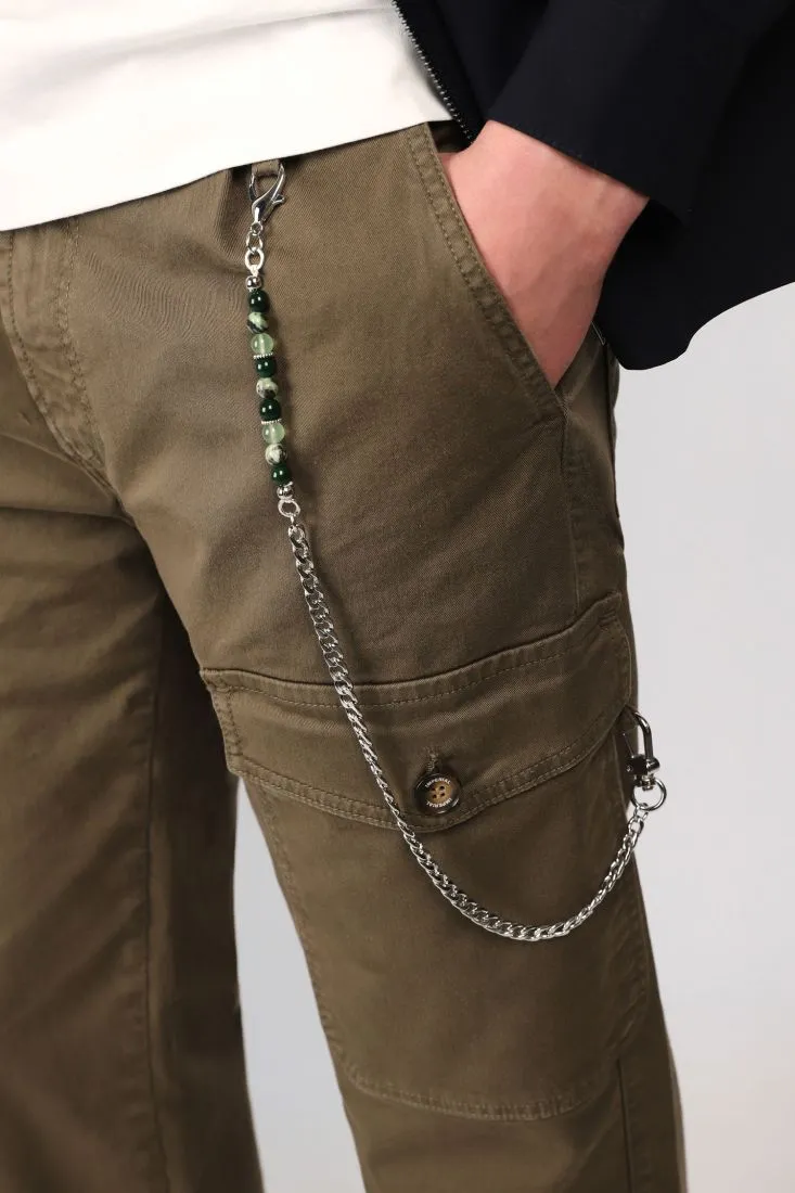 Pantaloni straight monocolour con catena e pinces
